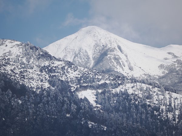 Besneeuede bergen bij Sakteng, Bhutan