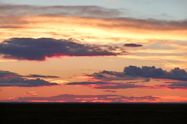 Zonsondergang bij Kherlen rivier, Mongolië 2010